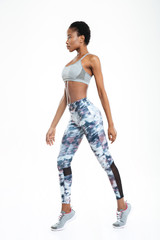 Side view portrait of a sports afro american woman