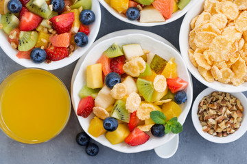 healthy breakfast with fruit salad, top view