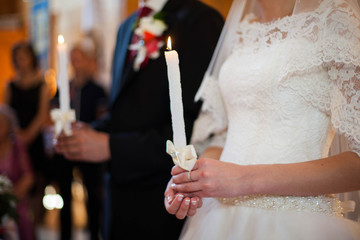 Obraz premium a wedding ceremony of happy young couple in a historic wooden ch