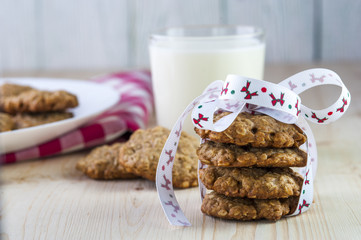 Stack of oatmeal cookies on wooden table