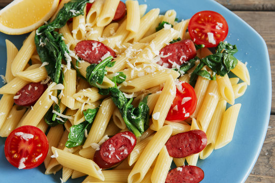 Pasta With Sausage Spinach Tomato And Cheese