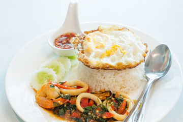 Thai food,Rice with stir-fried combination of mussel,squid, shri