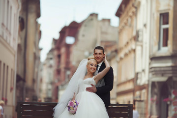 Fototapeta premium happy beautiful stylish luxury gorgeous young couple on the back