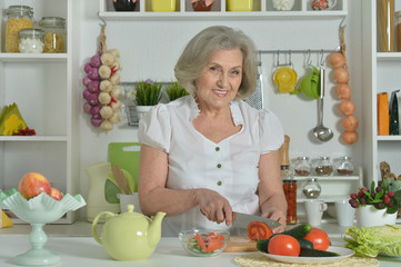 Senior woman cooking in kitchen