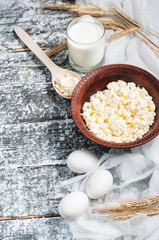 Dairy products on wooden table. Milk, cheese, egg. Top view with copy space