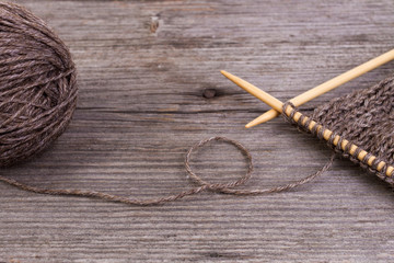 brown knitting and wool yarn