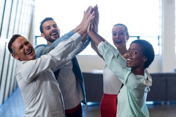 Colleagues doing high five