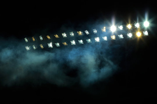 Stadium lights against dark night sky