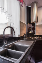 Granite sink in elegant kitchen