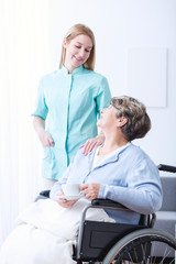 Obraz premium Elderly female on wheelchair