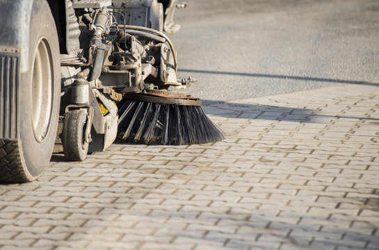 Street sweeper machine cleaning the street