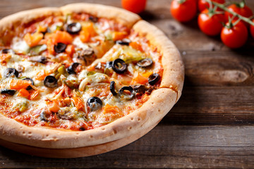 Vegeterian pizza with mushrooms and olives