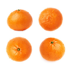 Fresh juicy tangerines fruits covered with the multiple water drops, isolated over the white background