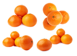 Piles of multiple ripe fresh juicy tangerines, isolated over the white background