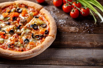Vegeterian pizza with mushrooms and olives