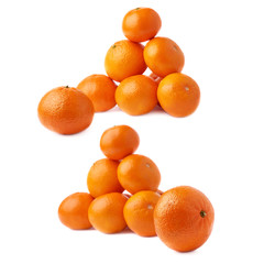 Pile of multiple ripe fresh juicy tangerines, isolated over the white background