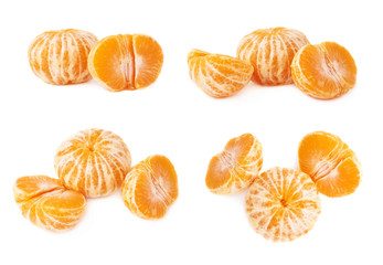 Two halves anh whole fresh juicy tangerine fruit isolated over the white background