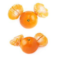 Two halves and fresh juicy tangerine fruit isolated over the white background