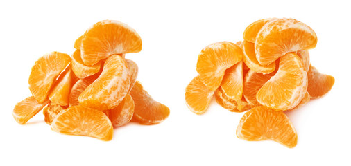 Pile of slice sections of tangerine isolated over the white background