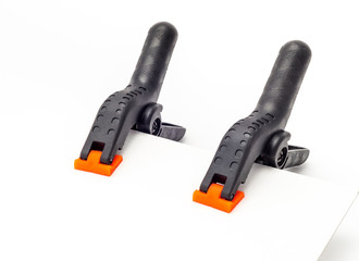 Plastic spring Clamps, used for clamping items.
