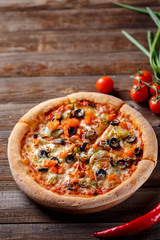 Pizza with tomato, mushroom and olives
