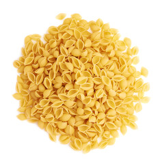 Pile of dry conchiglie pasta over isolated white background