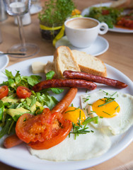 Herb omelette with chives and oregano sprinkled with chili flakes, garlic panini toasts