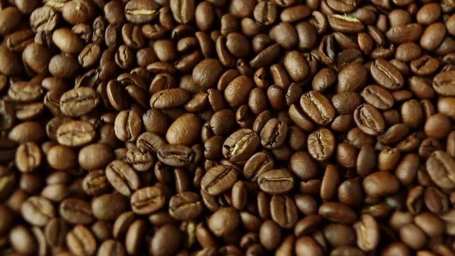 Rotation of aromatic roasted coffee beans