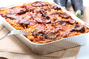 Timballo di riso con pomodoro e melanzane