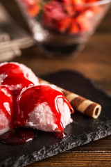 Vanilla ice cream with berries and waffle