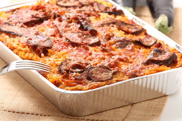 Timballo di riso con pomodoro e melanzane