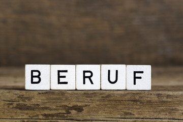 The German word profession written in cubes
