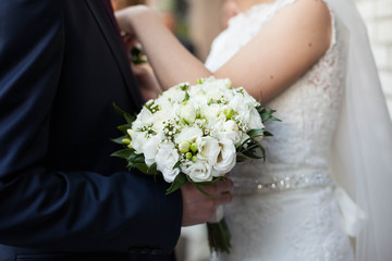Obraz na płótnie Canvas stylish, beautifully decorated wedding bouquet of lovely flowers