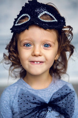 portrait of a little girl 2 years in a Studio