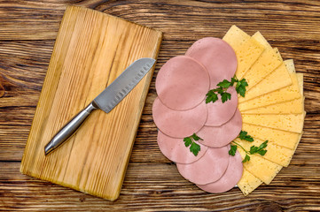 Sliced cheese and sauced with knife