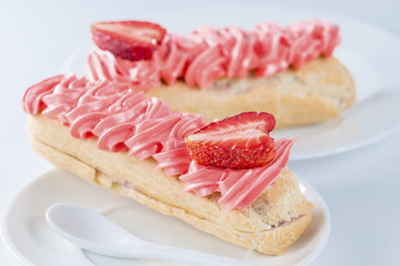 eclair with strawberry, shallow depth of field