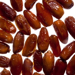 date fruits on white