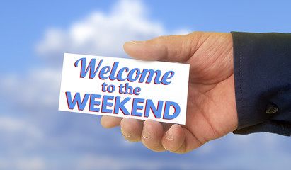 Man holding white business card with text welcome to the weekend