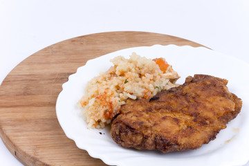 Pork meat with rice with vegetables