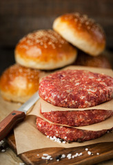 Raw ground beef meat steak cutlets and burger buns