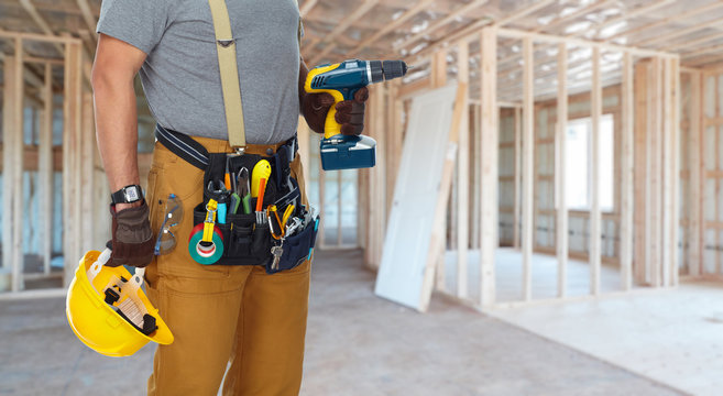 Builder handyman with drill.