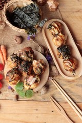 Takoyaki fried balls with sauce ,tradinition japanese food.