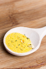 Mixed spices in the wooden spoon