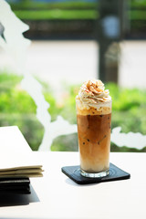 Ice coffee on white table