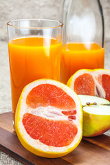 Juice of apples and red grapefruit.