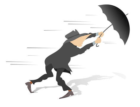Windy day. Man tries to hold an umbrella gone with the wind

