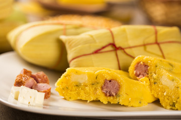 Salty Pamonha with sausage and cheese - typical food of green co