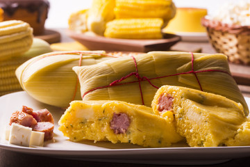 Salty Pamonha with sausage and cheese - typical food of green co