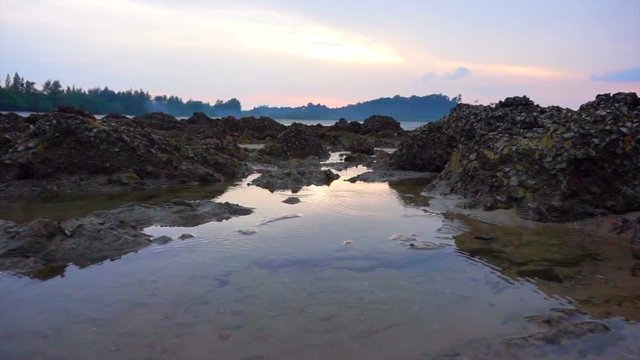 Beautiful sunset evening scene of Andaman sea. Koh Phayam Island beach in Ranong, Thailand