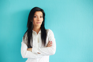 Young businesswoman in white shirt